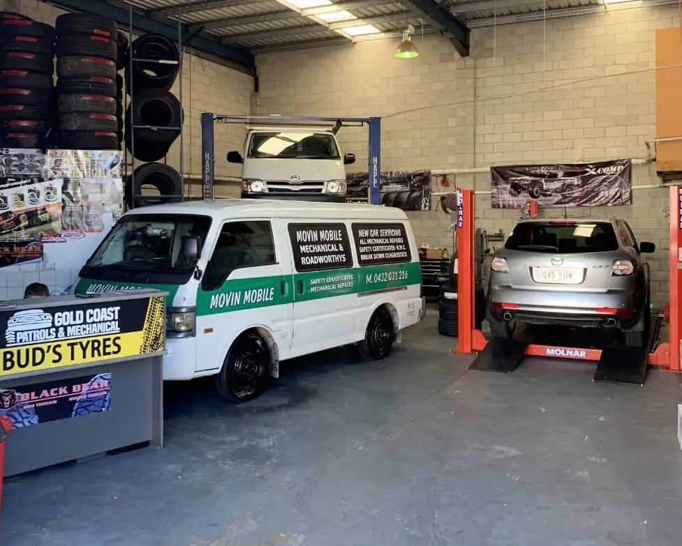 Mobile mechanic van set up as a workshop on site
