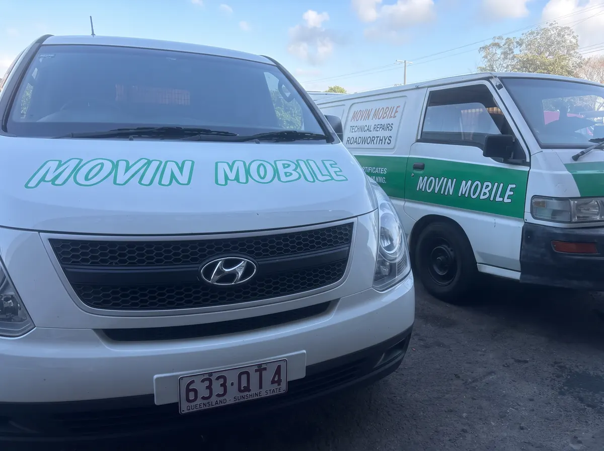 Movin Mobile Hyundai and Mitsubishi service vans parked together